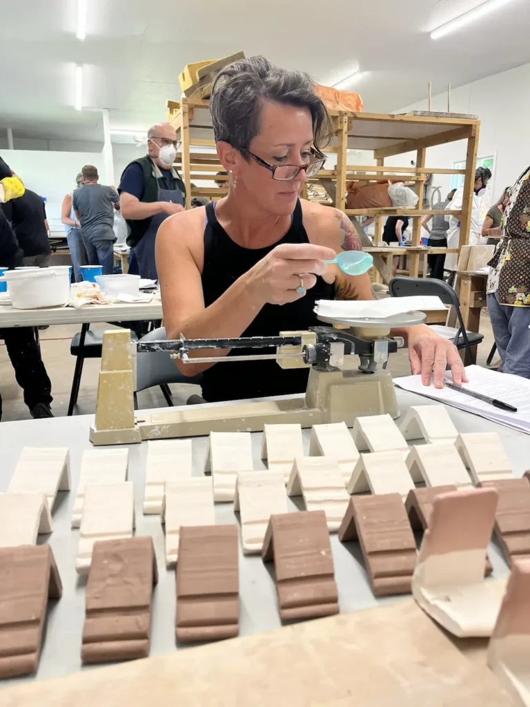 Making test tiles for new glazes at John Britt's Workshop in Creston