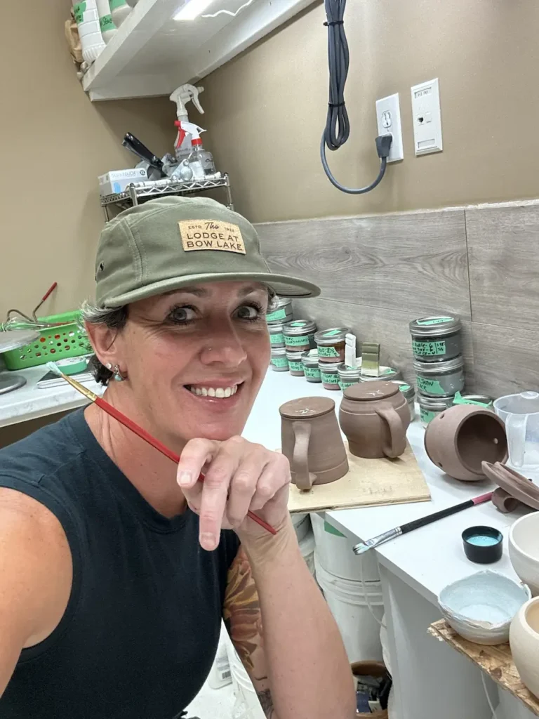 Mel waxing bottoms at her home studio