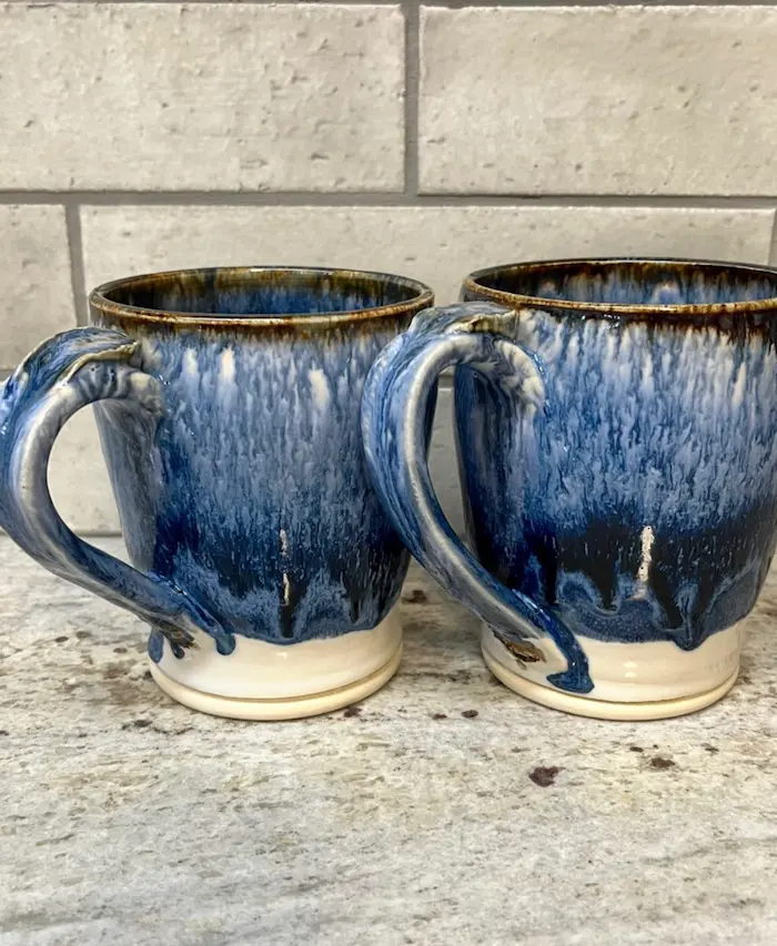 Blue glazed pottery mugs