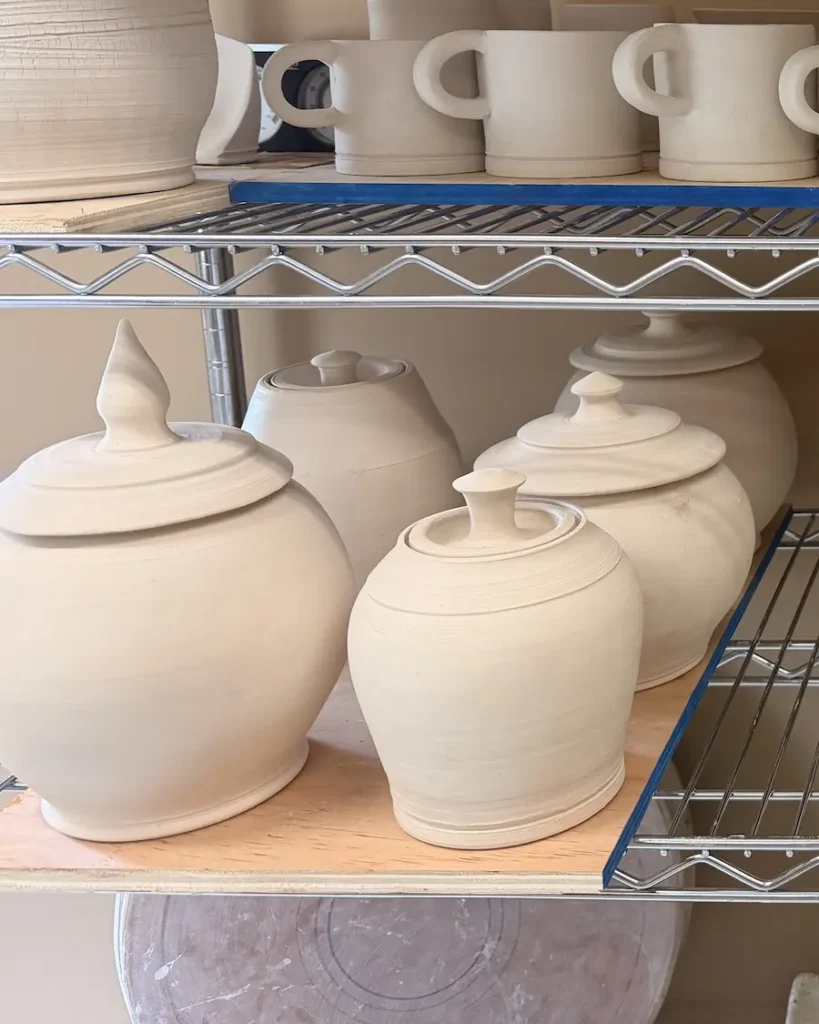Level 2 pottery class creating lidded jars